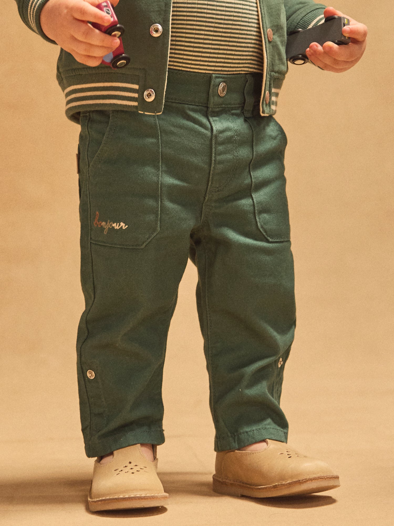 Dunkelgrüne, hochklappbare Hose Baby Junge
